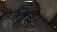 Clear the rubble in the room's corner (Image via Deep Silver)